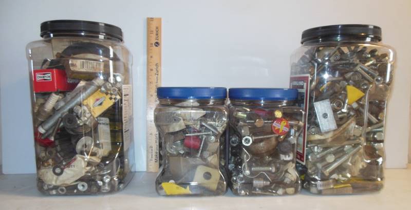 lot 85 image: Holy Hardware, Batman Four containers loaded with hardware and small parts - see photos for other angles.