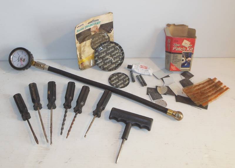 lot 86 image: Tire Repair Items and Longacre Tire Pressure Gauge