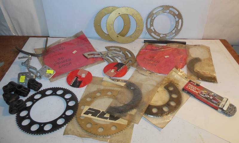 lot 94 image: New Sprockets and Other Parts Including EK Chain Racing Kart Chain Enuma Chain No. 29HRD1 114 Links, Rocket Sprockets and More