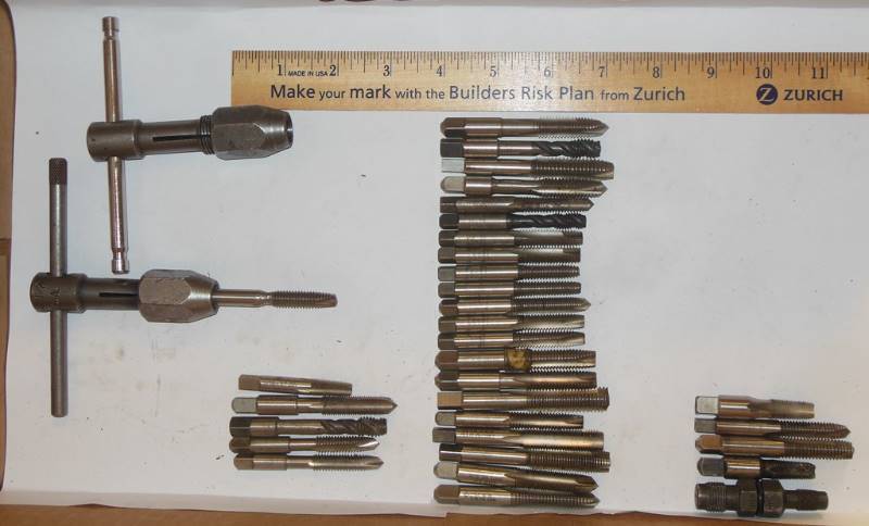 lot 110 image: Mediumish Drill Taps and Holders (Holder with tap is marked 14 - 12)