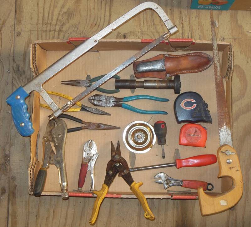 lot 127 image: Used Tools (to varying degrees - see photos) Including Saws, Wiss Snips, Husky Brand Screwdrivers and Wrench, Craftsman Wrench, Tape Measures, Pliers, Box Cutter, Leather Pouch and More