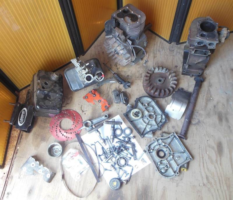 lot 156 image: Engine Blocks, Side Covers, Flywheels, Gas Tanks, etc.