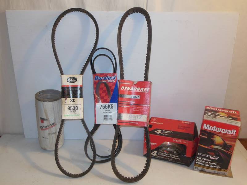 lot 158 image: Unused, Still in Package Auto Parts Fleetguard ES System FF2200 Fuel Filter, Duralast, Gates and Dynacraft Belts, GE Halogen H4651 Headlamp and Motorcraft FL-1995  Oil Filter