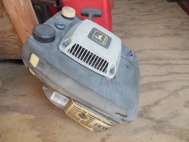 lot 160 image: Engine (Lawnmower) marked John Deere Kawasaki Code FC150V-JSOO, ENO FC150VJ42127 - from previous auction (never picked up) consignor stated it was a running engine when removed and saved