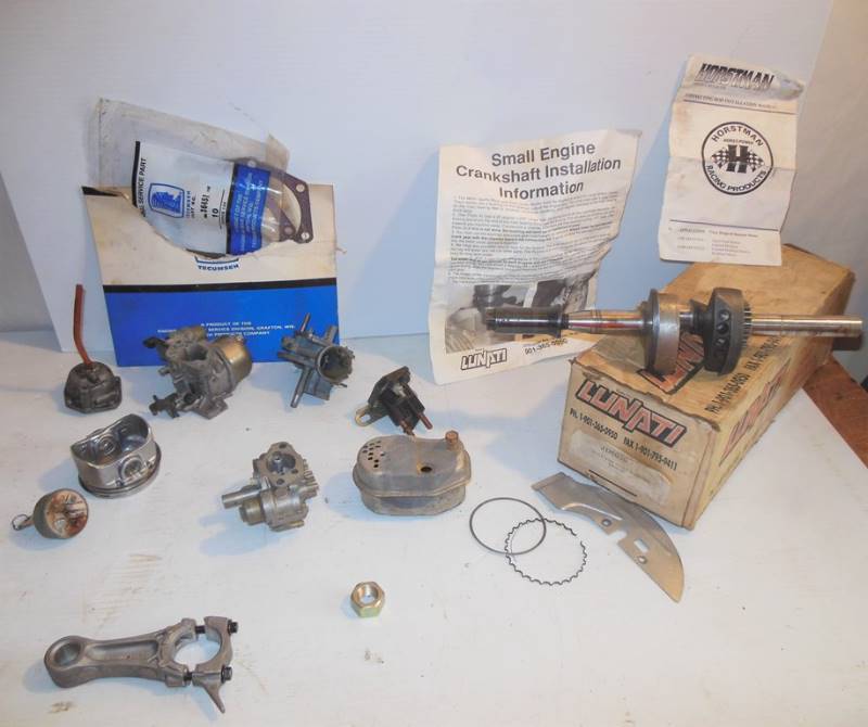 lot 159 image: Miscellaneous Auto Small Engine  Go Kart etc. Parts and Components Piece marked Lunati 3GT in a box Marked JD6030  Crank 4340 (assuming a crank shaft component), Possible carburetor components