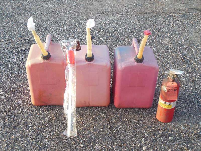 lot 198 image: Three Plastic Gas Cans, In Package Syphon and Fire Extinguisher (needs charge)
