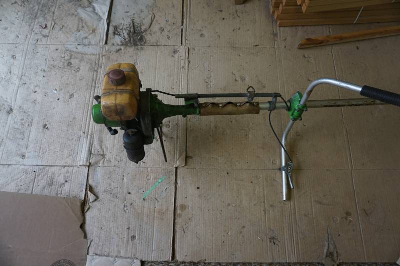lot 49 image: Green Machine Brand Gas Powered Weed Trimmer