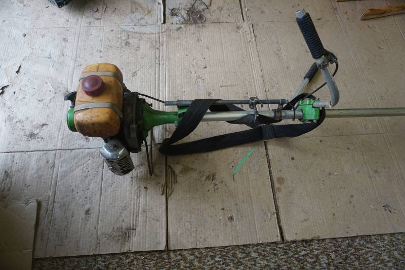 lot 50 image: Green Machine Brand Gas Powered Weed Trimmer