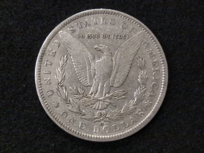 lot 25 image: 1889 O Morgan Silver Dollar...