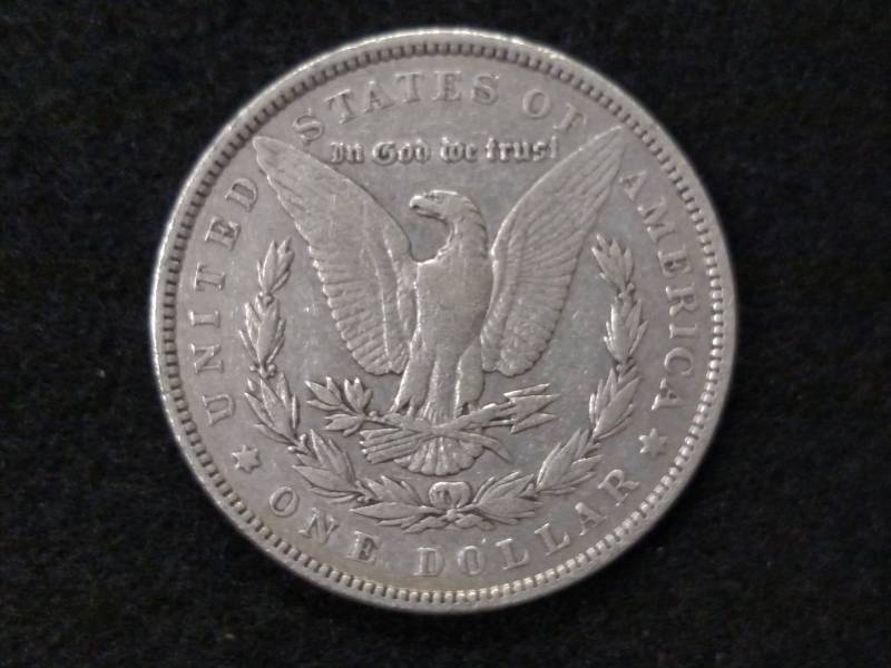 lot 26 image: 1890 Morgan Silver Dollar...