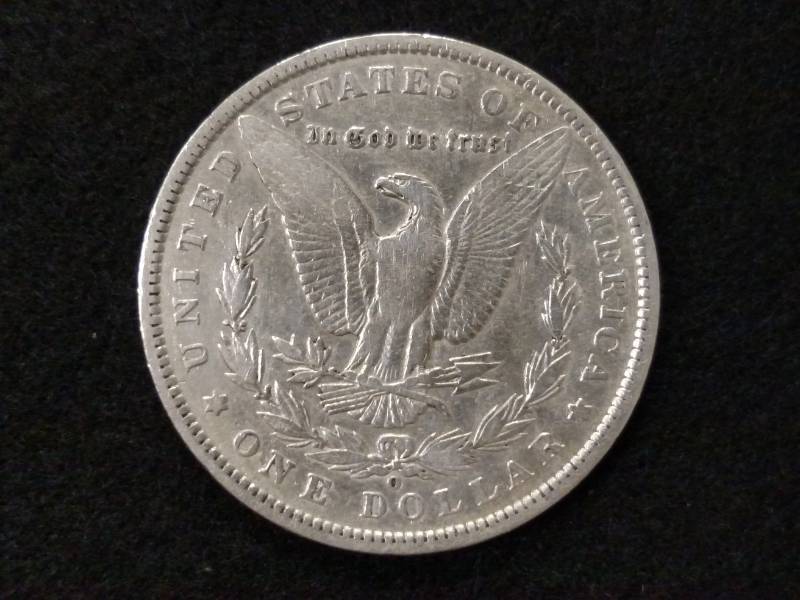 lot 27 image: 1890 O Morgan Silver Dollar...
