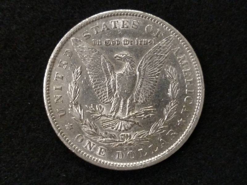 lot 28 image: 1890 S Morgan Silver Dollar...