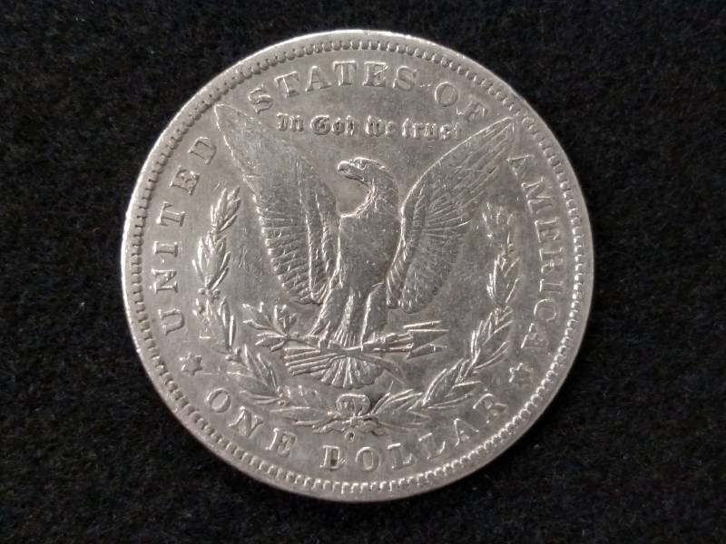 lot 34 image: 1899 O Morgan Silver Dollar...