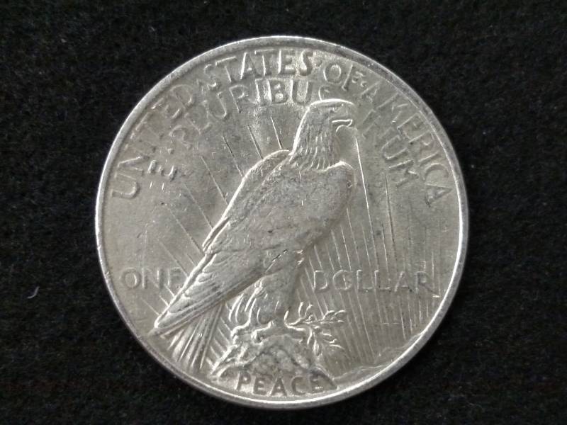 lot 54 image: 1922 Peace Silver Dollar...