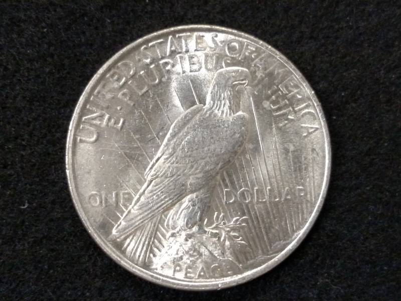 lot 56 image: 1922 High Grade Peace Silver Dollar...