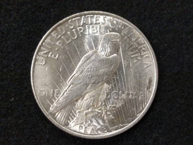 lot 57 image: 1922 High Grade Peace Silver Dollar...