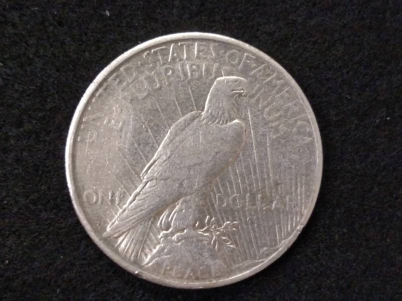 lot 62 image: 1922 S Peace Silver Dollar...