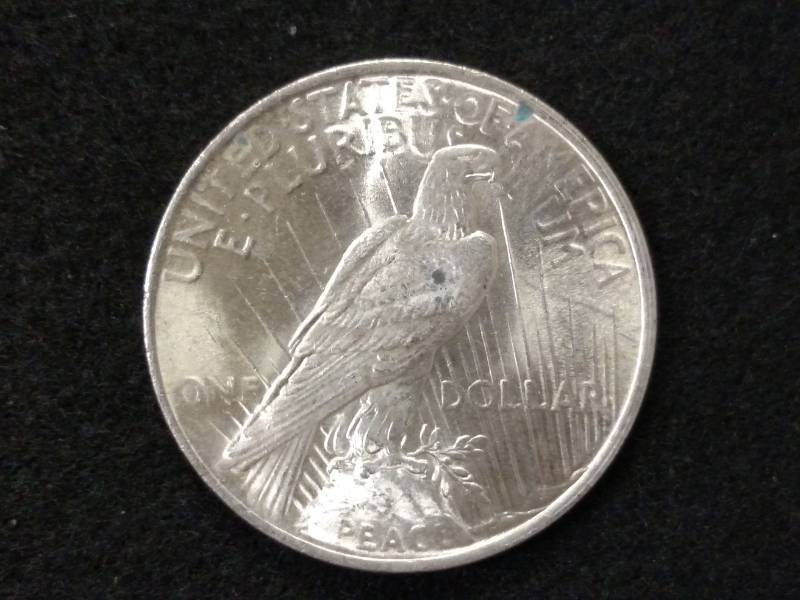 lot 64 image: 1923 High Grade Peace Silver Dollar...