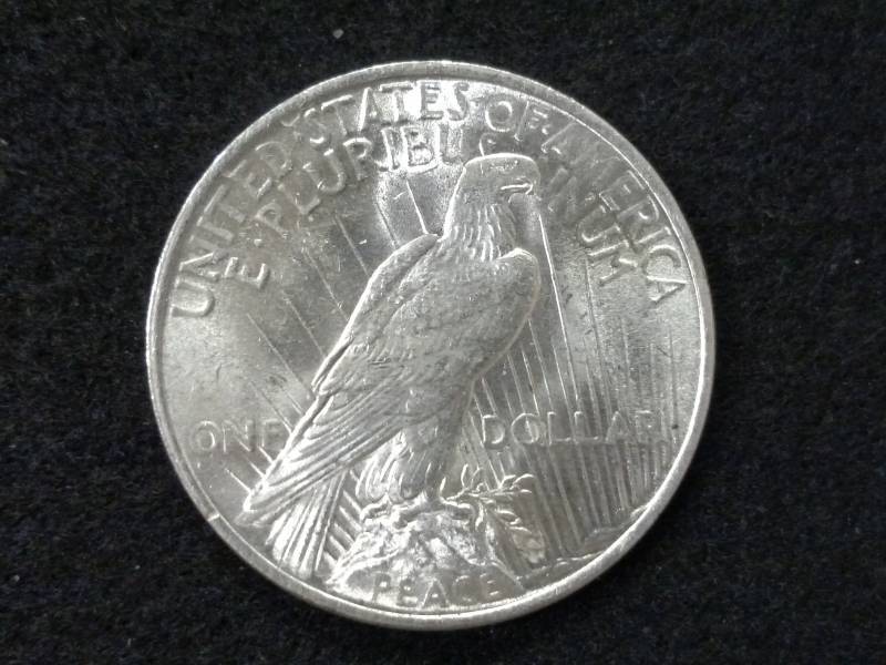 lot 65 image: 1923 High Grade Peace Silver Dollar...