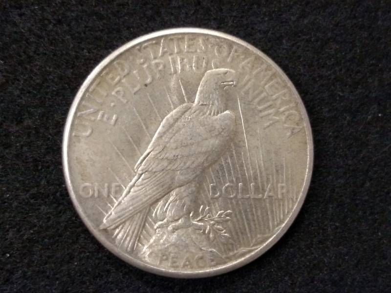 lot 80 image: 1925 Peace Silver Dollar...