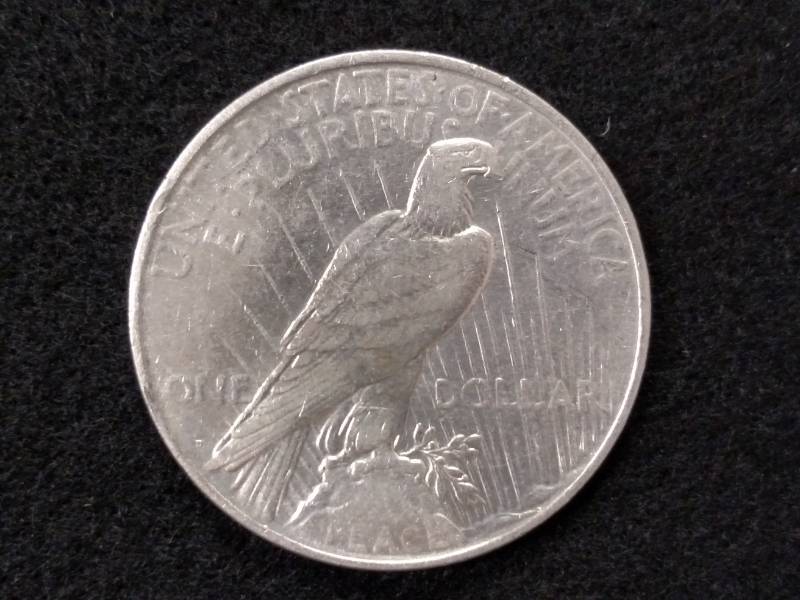 lot 87 image: 1927 D High Grade Peace Silver Doll...