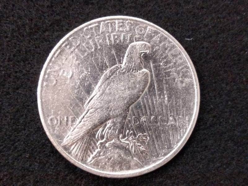 lot 89 image: 1934 D Peace Silver Dollar...