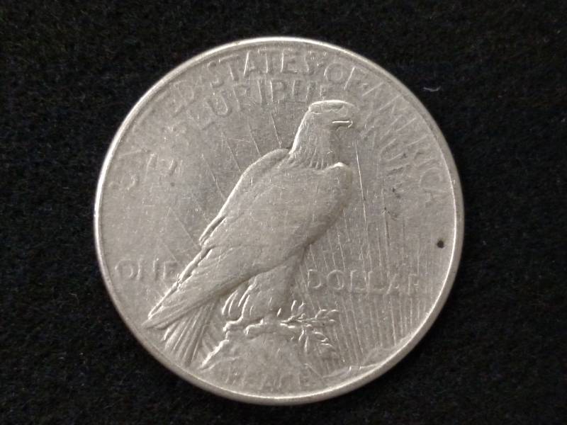 lot 91 image: 1935 Peace Silver Dollar...