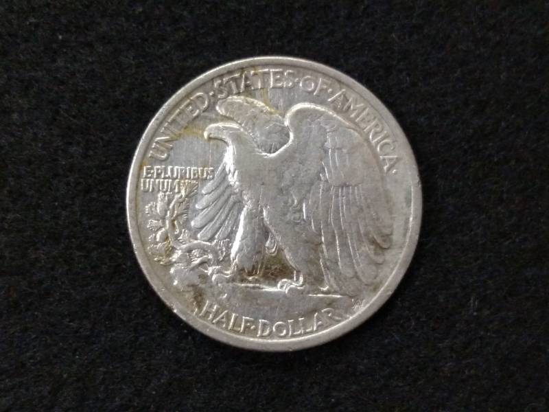 lot 113 image: 1934 Walking Liberty Silver Half Do...