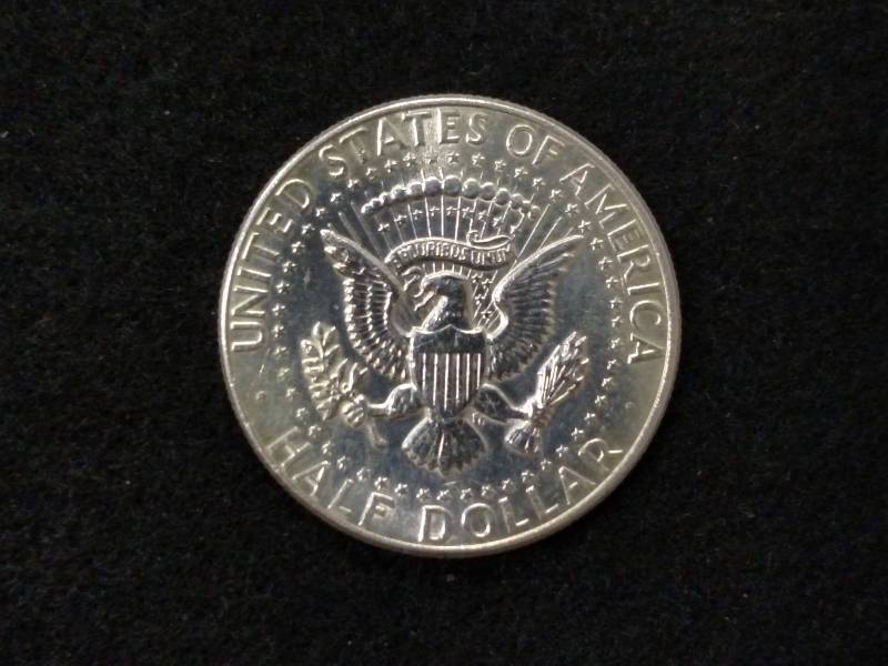 lot 132 image: 1964 BU Kennedy Silver Half Dollar...