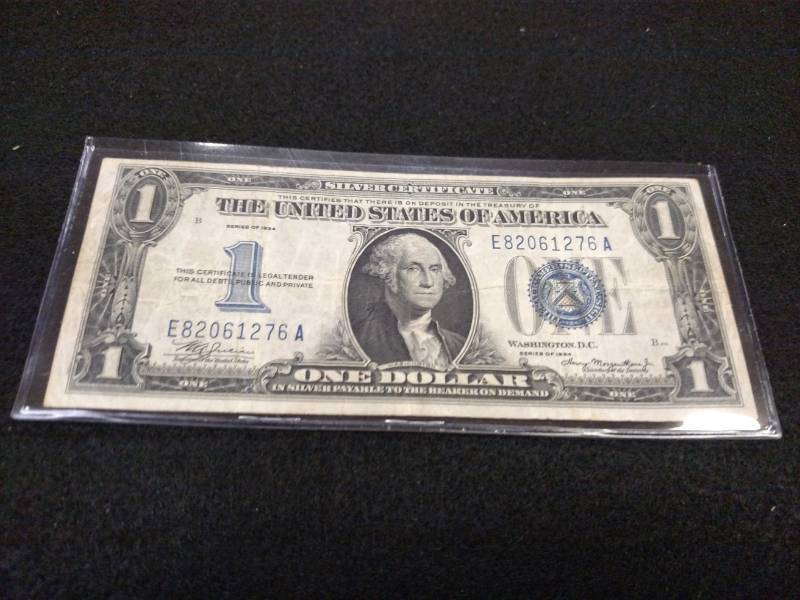 lot 181 image: 1934 One Dollar Funny Back Silver C...