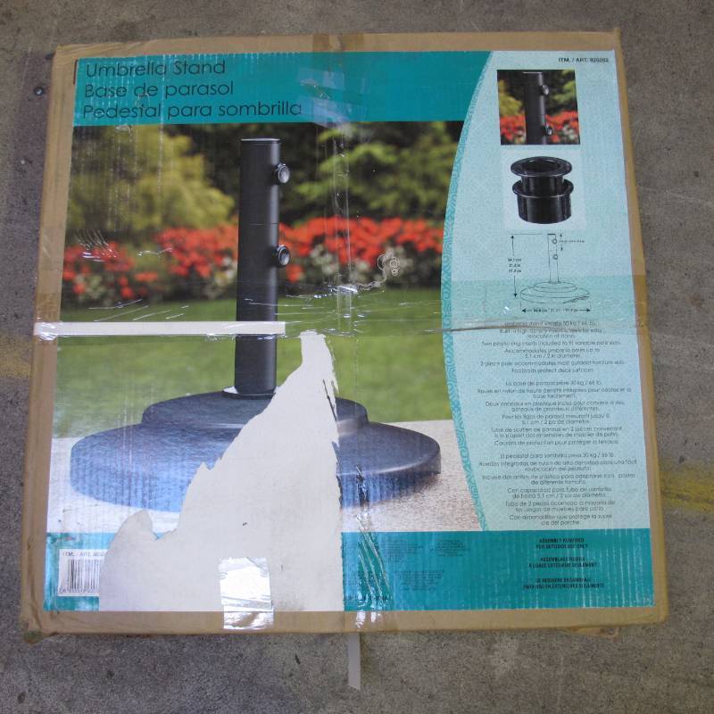 lot 10 image: Costco Umbrella Stand - Fits Mulitple Diameters  Wheels