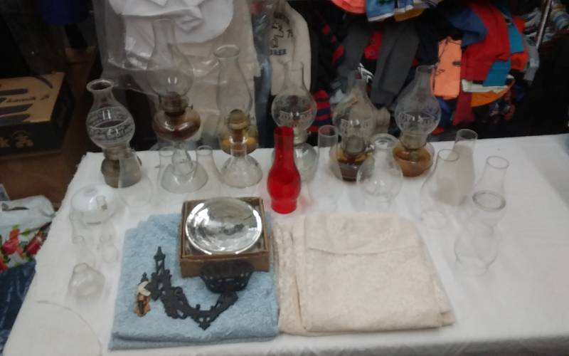 lot 32 image: Collection Of Vintage Oil Lamps, Chimneys, Cast Iron Wall Bracket, Reflector, Old Lace
