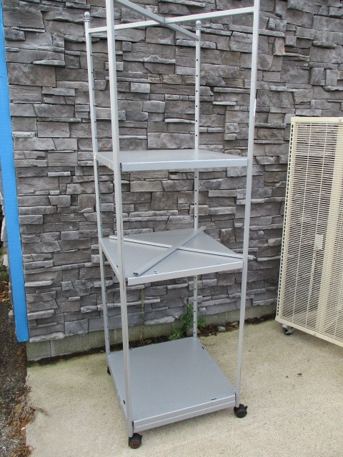 lot 87 image: 2 Tier Shelf with adjustable shelves that folds flat