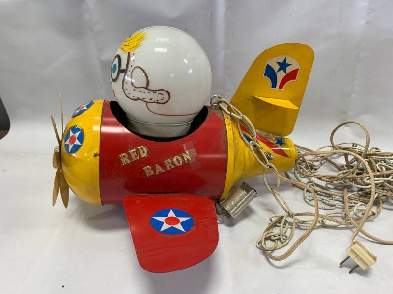 lot 11 image: Antique Red Baron Electric Glove 14 Long