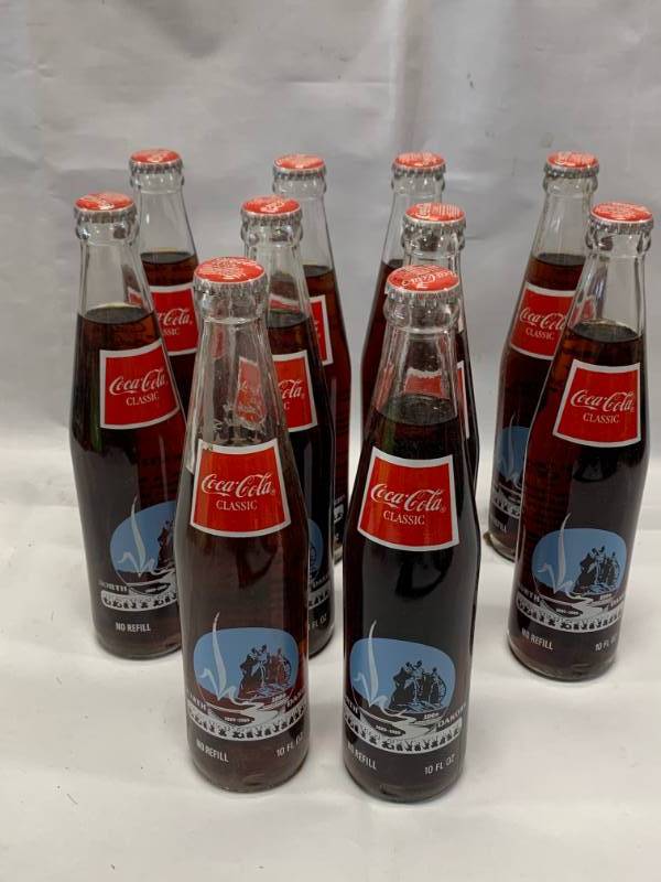 lot 81 image: Lot of 10 North Dakota Centennial Coca Cola Bottles