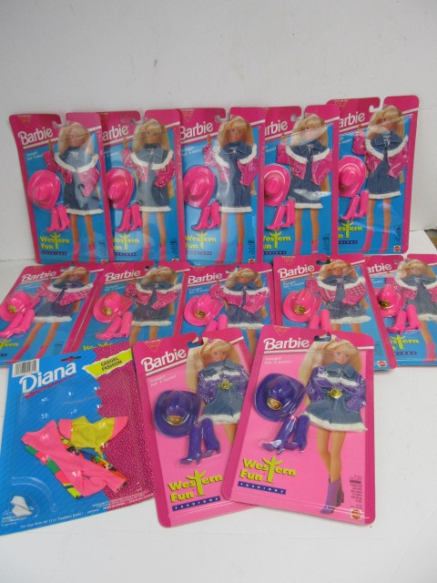 lot 32 image: Group of Unopened Barbie Outfits