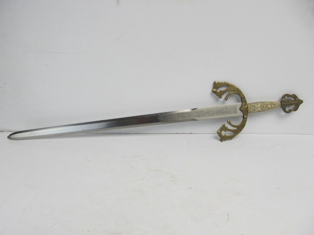 lot 90 image: Vintage Decorative TOLEDO Sword wOrnate Handle