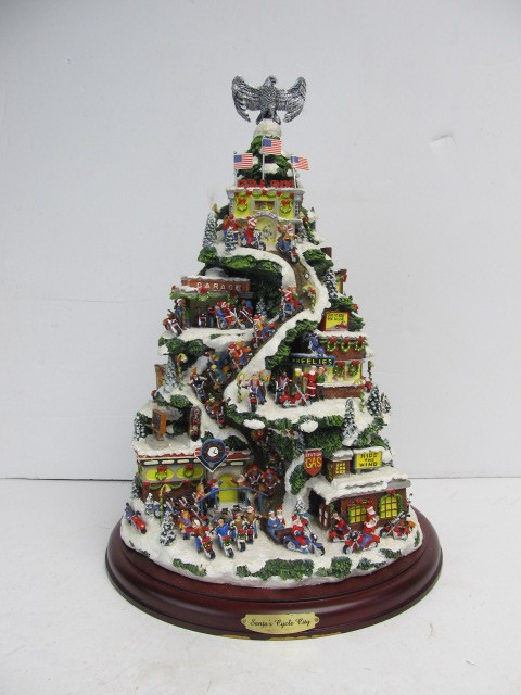 lot 96 image: Santas Cycle City Porcelain Christmas Tree Motorcycle Display