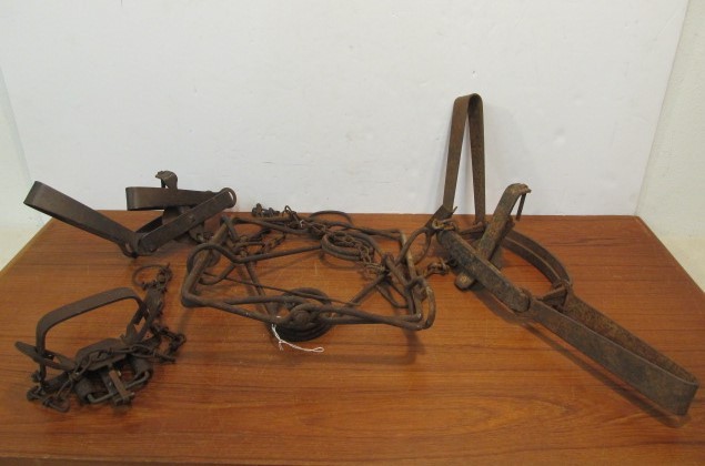 lot 173 image: Group of Vintage & Antique Cast Iron Traps