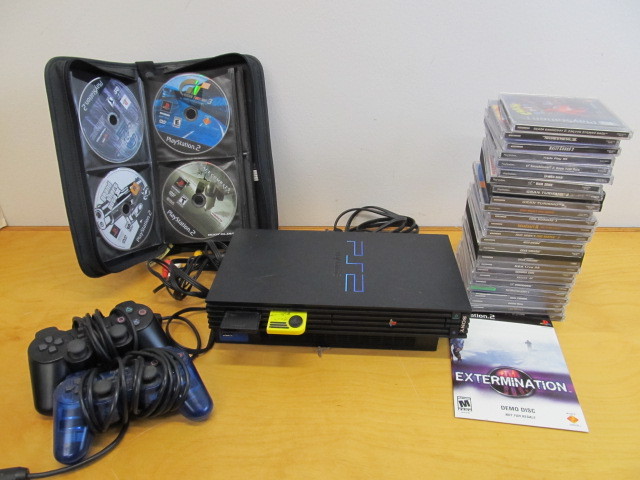 lot 27 image: Working PLAYSTATION 2 Video Game System w PS1 and PS2 Games