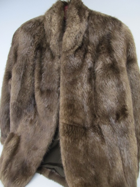lot 102 image: Mint Condition Never Worn ELAN Fox Fur Coat