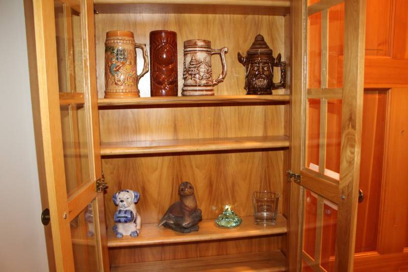 lot 427 image: Table Dcor - Beer Steins, Dog Bank, Seal, And More