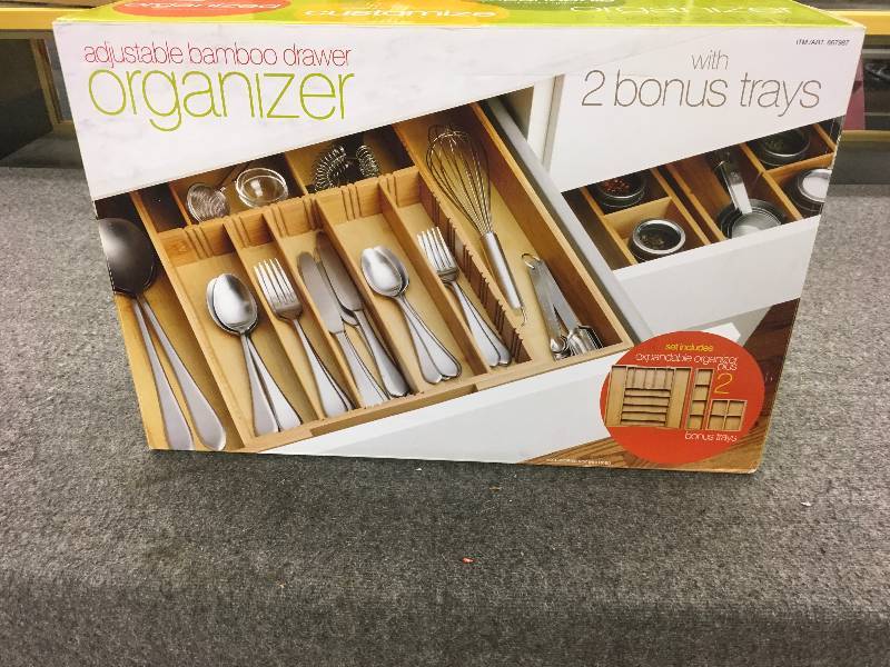 lot 289 image: Adjustable Bamboo Drawer Organizer, Retail $24.99