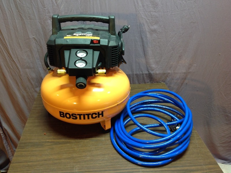 lot 20 image: Bostitch 150 PSI Air Compressor with Hose