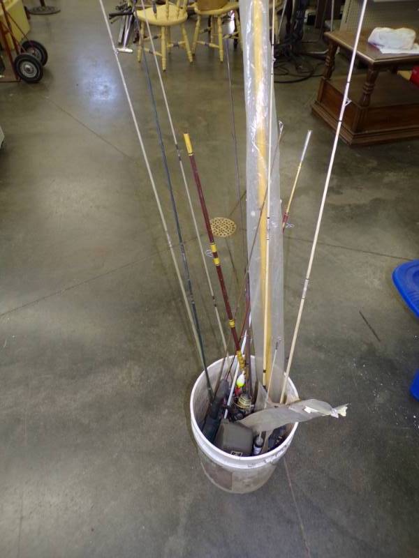 lot 83 image: Pail of Fishing rods and reels