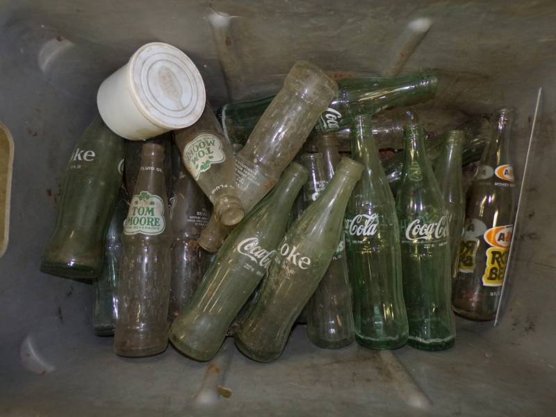 lot 84 image: Vintage Pop Bottles with tote