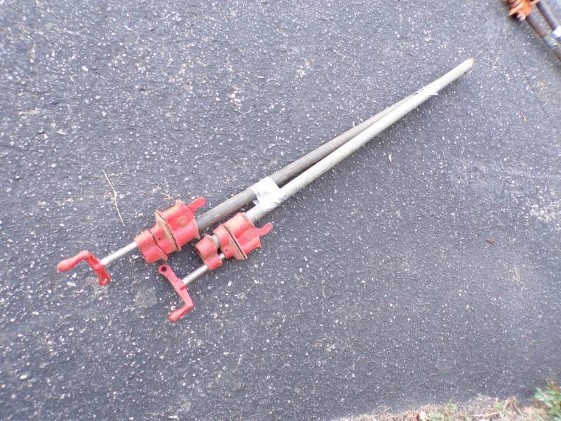 lot 123 image: Pair of Pipe Clamps with Pipes