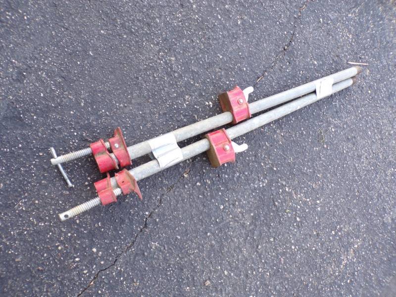 lot 124 image: Pair of Pipe Clamps with Pipes