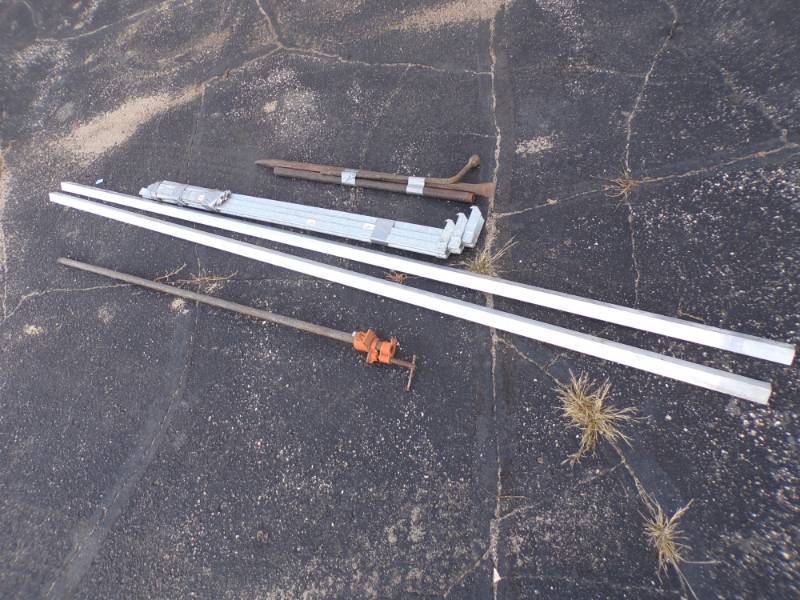 lot 125 image: Pipe Clamp, pry bars, wrench, Shelf plates and aluminum corners