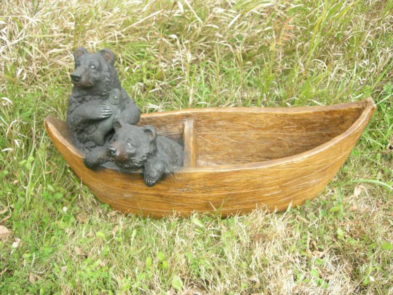lot 2 image: Bear on Boat Decor